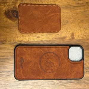 15 plus iPhone leather case with a magnetic back.